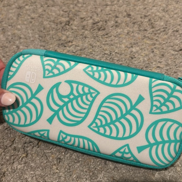 Teal Nintendo Switch Lite with matching Nintendo Animal Crossing Carrying Case - Picture 6 of 7